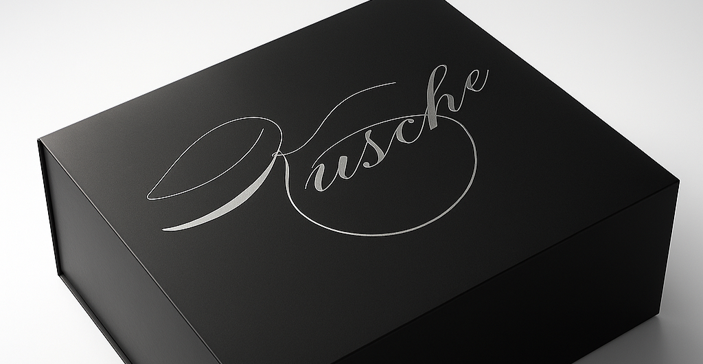 Black box with 'Kvsche' branding on a white background. With Magnetic close and matte finish and silver foil logo. Elegant packaging 