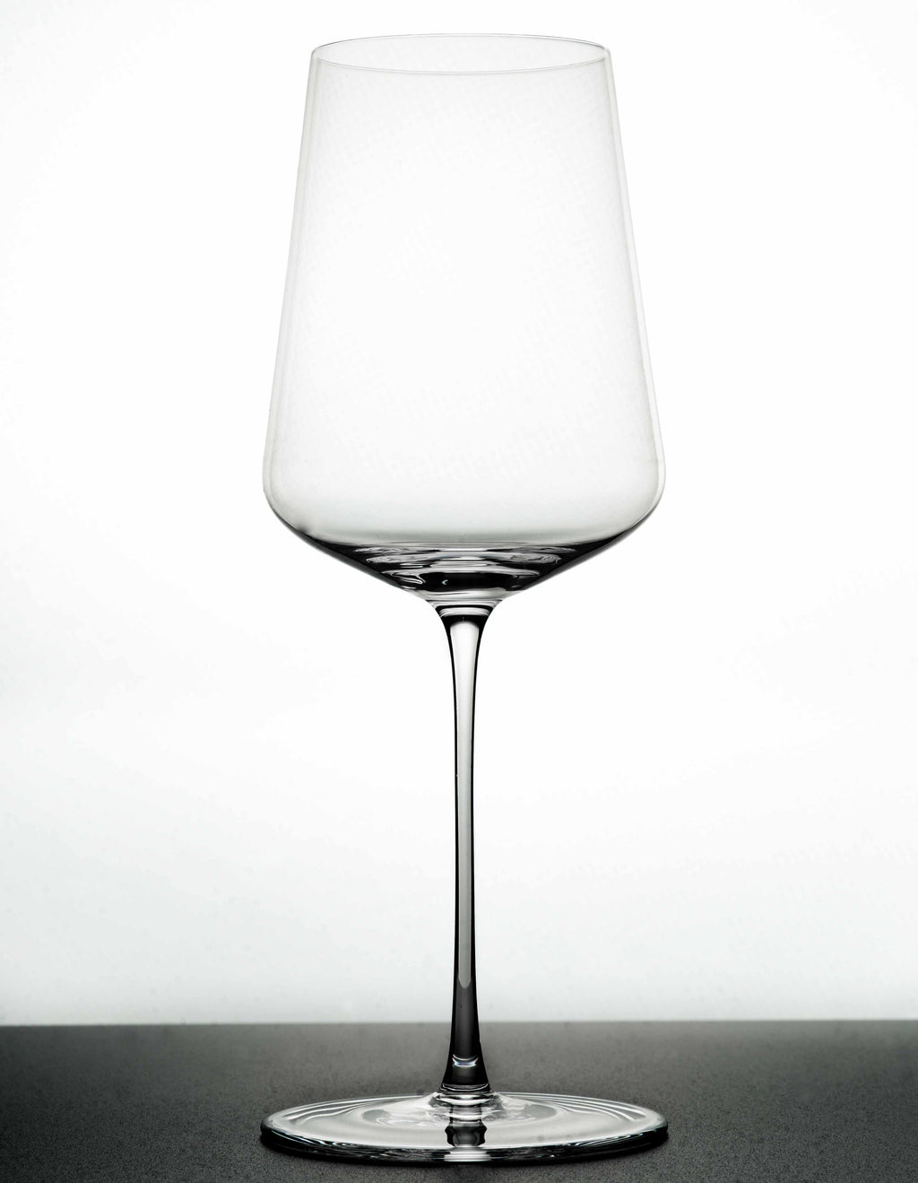 "The Mistress" white Wine Glass in white background and black - Luxury, premium and silent excellence design for wine lovers. Its an empty white wine glass