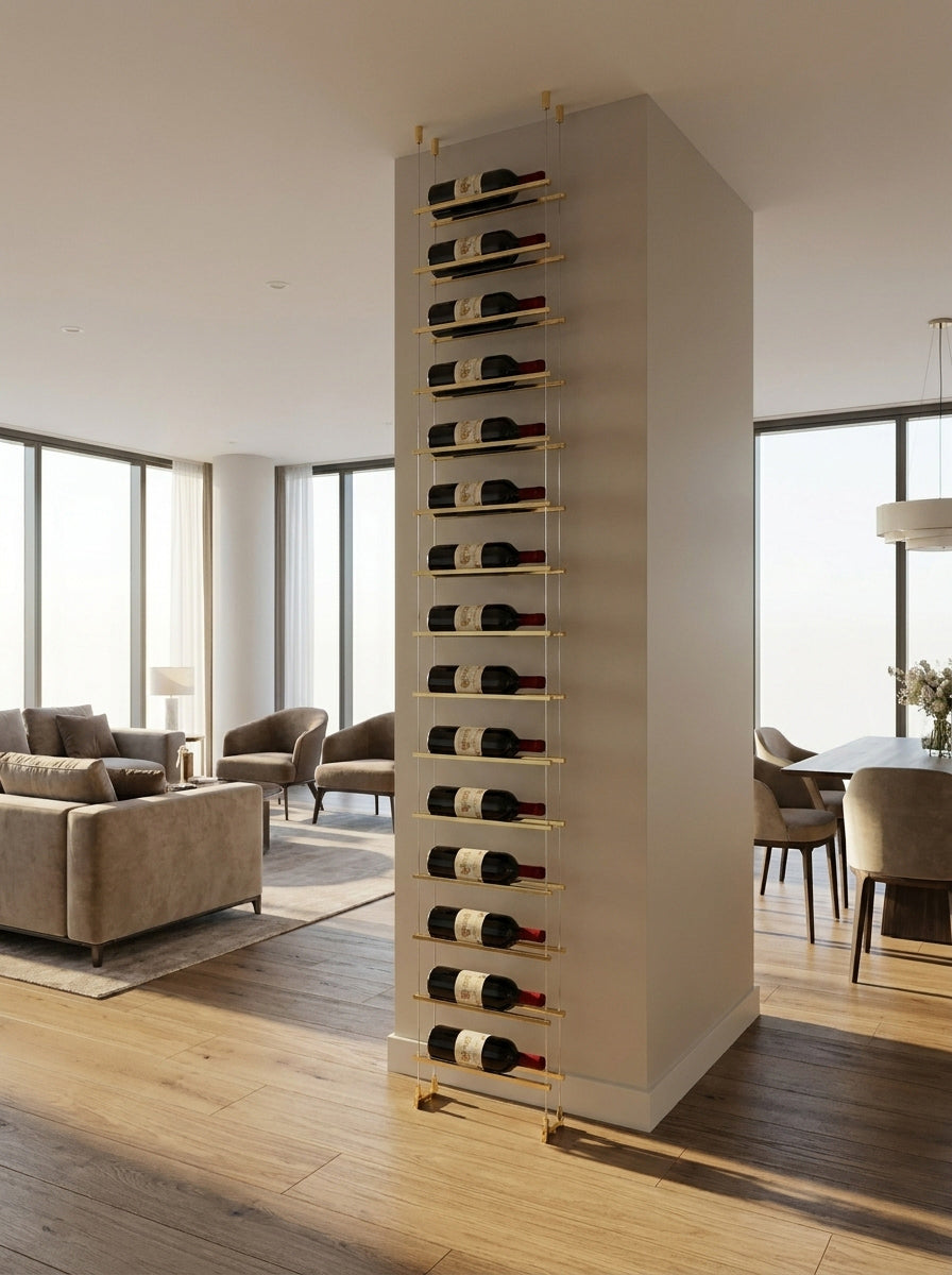 Kvsche Skyline brushed gold wine display mounted on a room divider between a living area and dining space