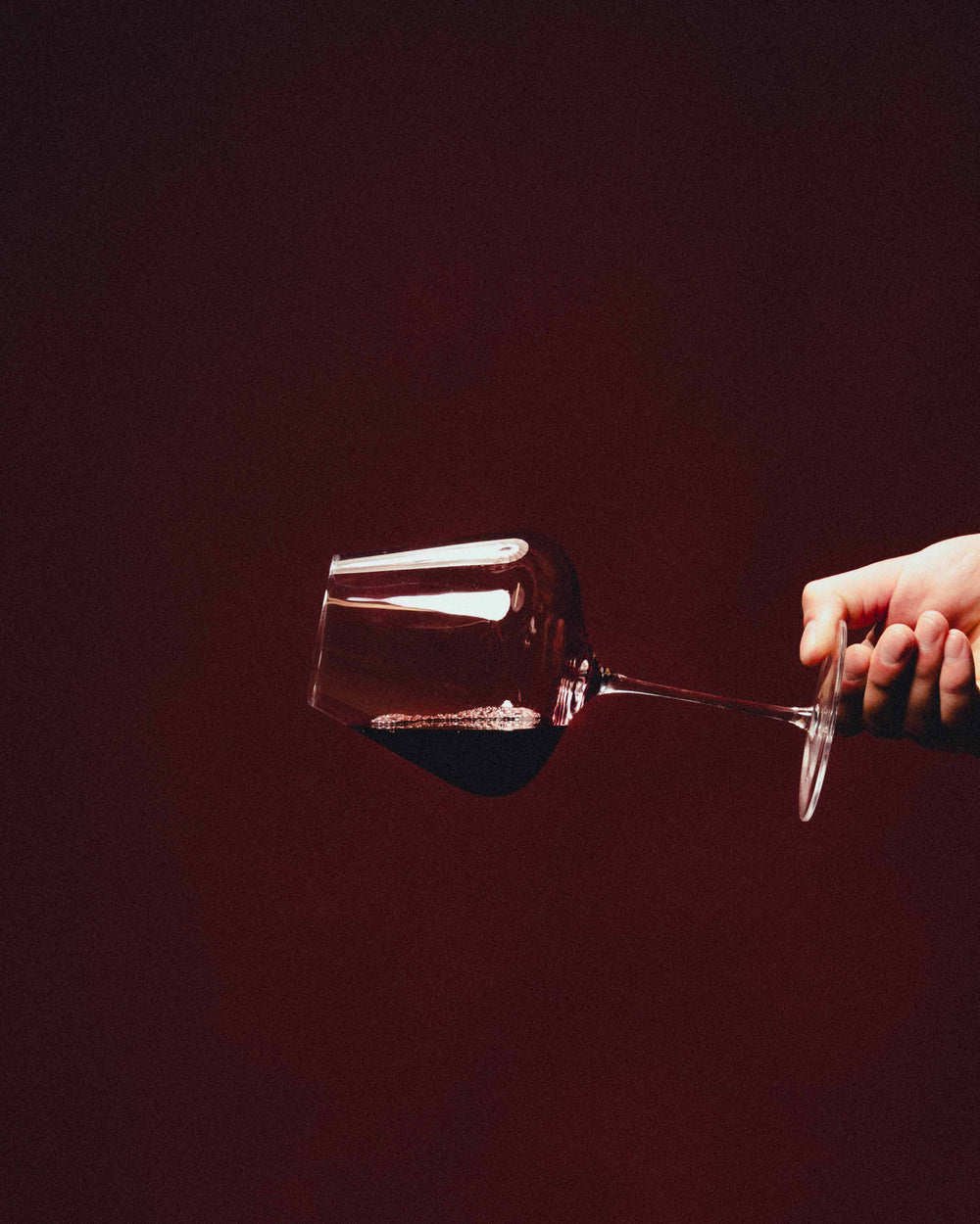 Kvsche Temptress red wine glass on a clean product background